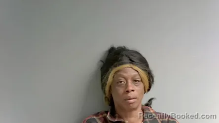 Mugshot of Contina Moss booked in Calhoun County, Alabama on April 10, 2026