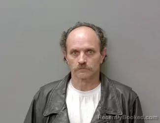 Mugshot of Charles Mahoney booked in Calhoun County, Alabama on July 27, 2026