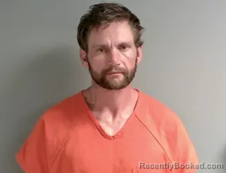 Mugshot of Russell Mcdonald booked in Calhoun County, Alabama on April 25, 2026