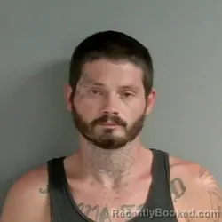 Mugshot of Dustin Pittenger booked in Calhoun County, Alabama on July 1, 2026