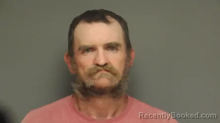 Mugshot of John Smith booked in Calhoun County, Alabama on June 15, 2026