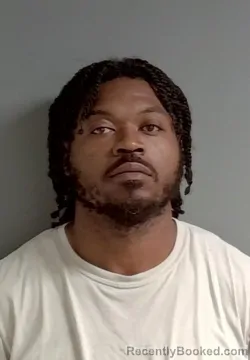 Mugshot of Dejuan Traylor booked in Calhoun County, Alabama on August 4, 2026