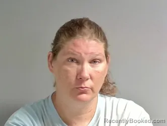 Mugshot of Jennifer Tolbert booked in Calhoun County, Alabama on September 9, 2026