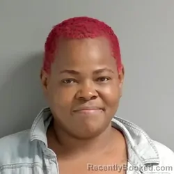 Mugshot of Aisha White booked in Calhoun County, Alabama on June 4, 2026