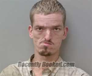 Booking photo from Calhoun County, Alabama