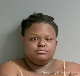 Mugshot of Kionna Woolf booked in Calhoun County, Alabama on May 18, 2026