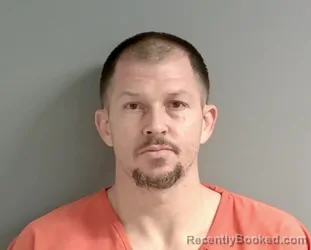 Booking photo from Calhoun County, Alabama