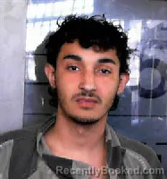 Mugshot of JOSE DANIEL SARMINTO TINAURE