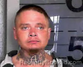 Mugshot of JUSTIN AUBRY MCKEEHAN