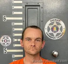 Mugshot of AXEL COKER booked in Cherokee County, Alabama on April 10, 2026