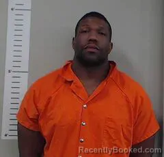 Mugshot of JUSTIN THOMPSON