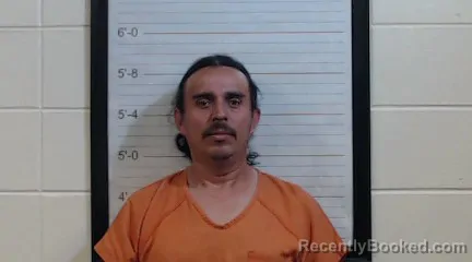 Mugshot of ISSACC FLORES