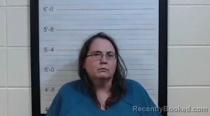 Mugshot of SARA ANN HOLLOWAY booked in Coffee County, Alabama on April 1, 2026