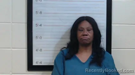 Mugshot of ANGELA MCGHEE booked in Coffee County, Alabama on June 20, 2026