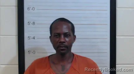 Mugshot of Carlos Antigo Thomas booked in Coffee County, Alabama on August 8, 2026