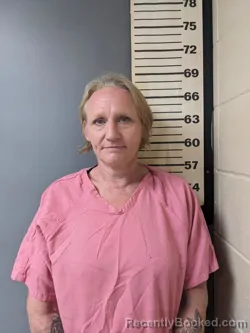 Mugshot of Carmen Montgomery Jowers booked in Covington County, Alabama on August 26, 2026