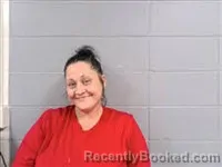 Mugshot of APRIL MARIE SHELTON booked in Dale County, Alabama on May 12, 2026