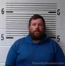 Mugshot of J MANN booked in Elmore County, Alabama on March 26, 2026