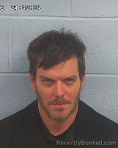 Mugshot of MICHAEL REYNOLDS