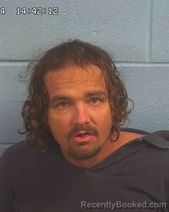 Mugshot of JUSTIN JENNETTE