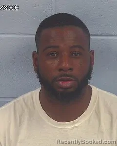 Mugshot of DEZMON WOOLF