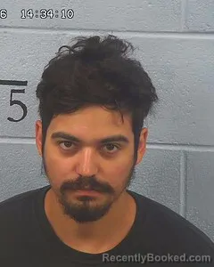 Mugshot of MICHAEL NAVARRO booked in Etowah County, Alabama on April 1, 2026