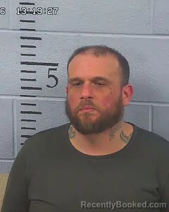 Mugshot of JUSTIN NEWBY booked in Etowah County, Alabama on April 3, 2026