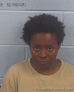 Mugshot of ATLANTIS HUFF booked in Etowah County, Alabama on April 21, 2026
