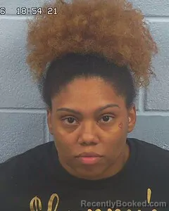 Mugshot of AJA MOTON booked in Etowah County, Alabama on June 2, 2026