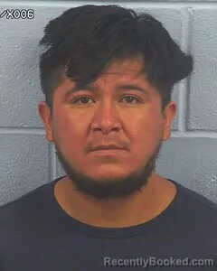Mugshot of MIGUEL JUAREZ booked in Etowah County, Alabama on June 10, 2026