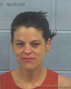 Mugshot of ERIN FLORES booked in Etowah County, Alabama on June 20, 2026