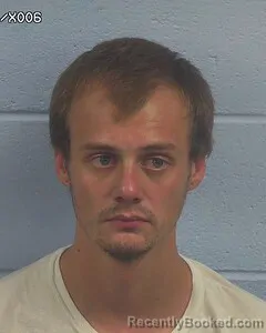 Mugshot of NICHOLAS MOORE booked in Etowah County, Alabama on June 23, 2026