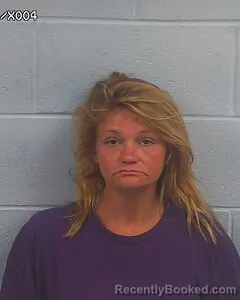 Mugshot of JANE DOE booked in Etowah County, Alabama on July 13, 2026