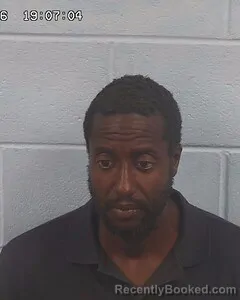 Mugshot of DLON JOHNSON booked in Etowah County, Alabama on July 17, 2026