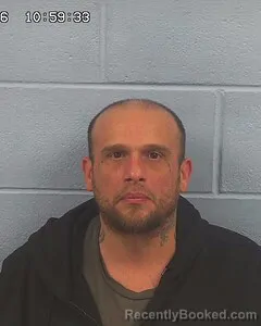 Mugshot of Justin Newby booked in Etowah County, Alabama on August 3, 2026