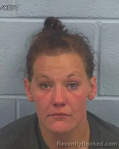 Mugshot of Amber Gibbs booked in Etowah County, Alabama on August 4, 2026
