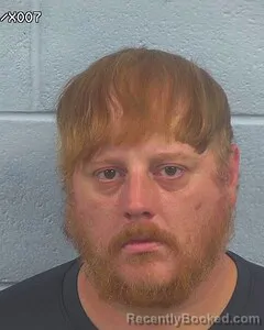 Mugshot of Kegan Harbin booked in Etowah County, Alabama on August 4, 2026