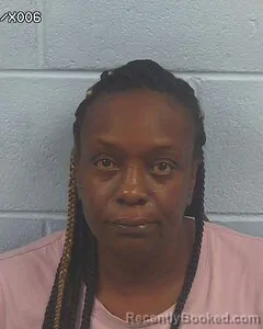 Mugshot of Aretha Jackson booked in Etowah County, Alabama on August 6, 2026