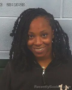 Mugshot of Kisharia Taylor booked in Etowah County, Alabama on October 4, 2026