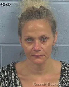 Mugshot of Jillian Miller Thompson booked in Etowah County, Alabama on October 6, 2026