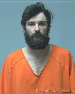 Mugshot of CHRISTOPHER REED booked in Escambia County, Alabama on March 27, 2026