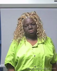 Mugshot of URSHA MCDONALD- WHITE booked in Escambia County, Alabama on April 26, 2026