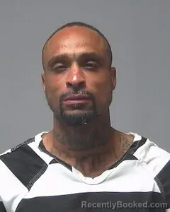 Mugshot of REMONTO JOHNSON booked in Escambia County, Alabama on April 29, 2026