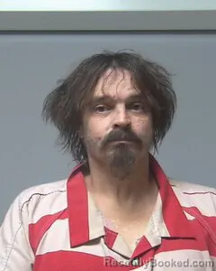 Mugshot of TRAVIS DAWSON booked in Escambia County, Alabama on May 6, 2026