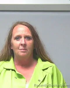 Mugshot of ANDREA COOK booked in Escambia County, Alabama on May 9, 2026