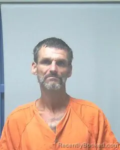 Mugshot of John Davis booked in Escambia County, Alabama on August 7, 2026