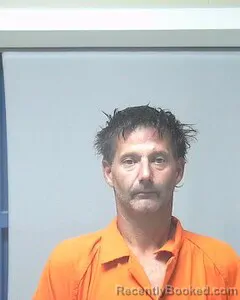 Mugshot of Travis Bell booked in Escambia County, Alabama on August 28, 2026