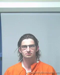 Mugshot of Justin Manhart booked in Escambia County, Alabama on August 30, 2026