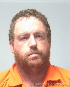 Mugshot of Charles Mooney booked in Escambia County, Alabama on October 3, 2026