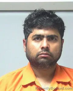 Mugshot of Bharath Vijaykumar booked in Escambia County, Alabama on October 3, 2026